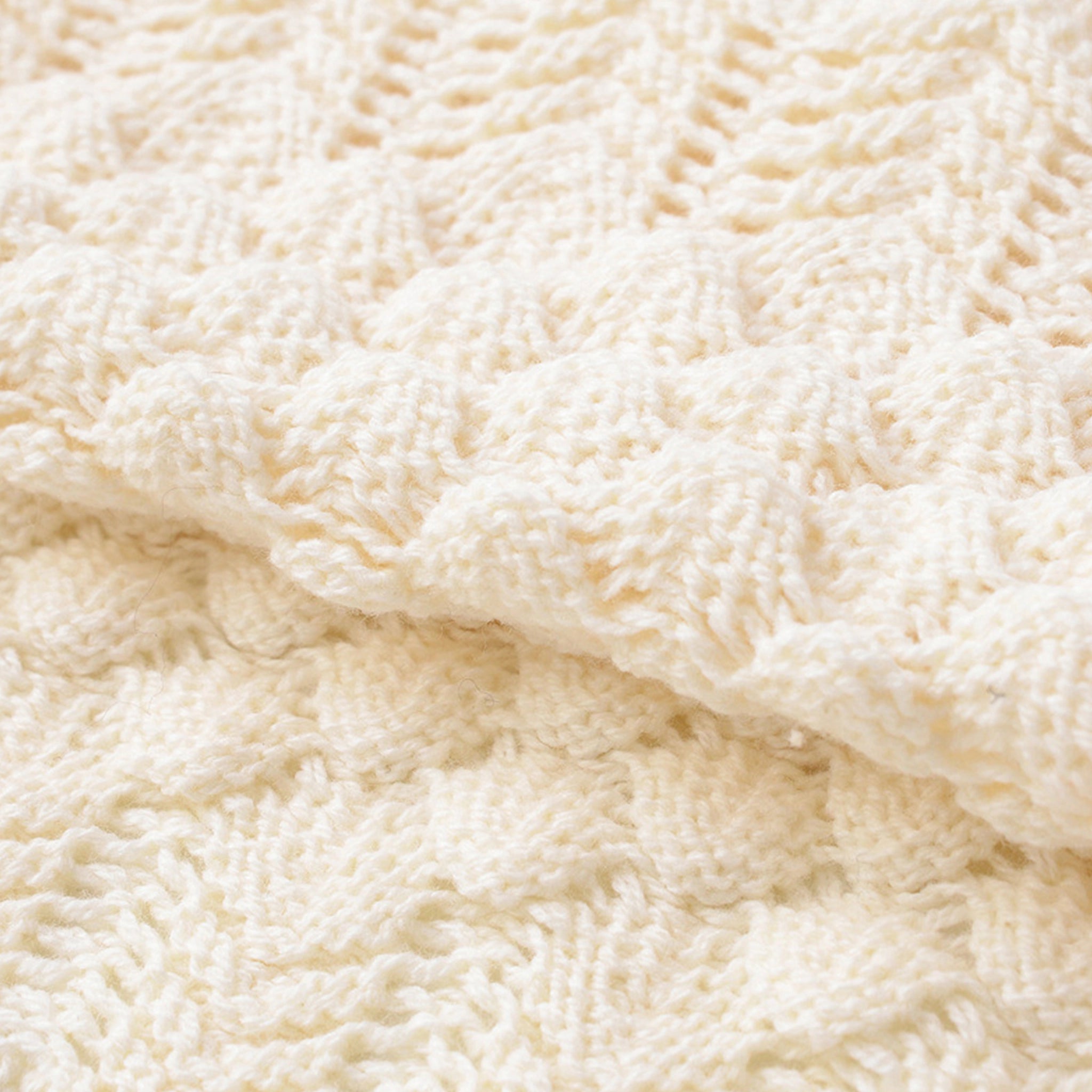 Close-up of beige textured fabric