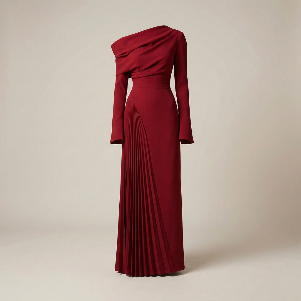 Red one-shoulder dress with pleated skirt on a beige background