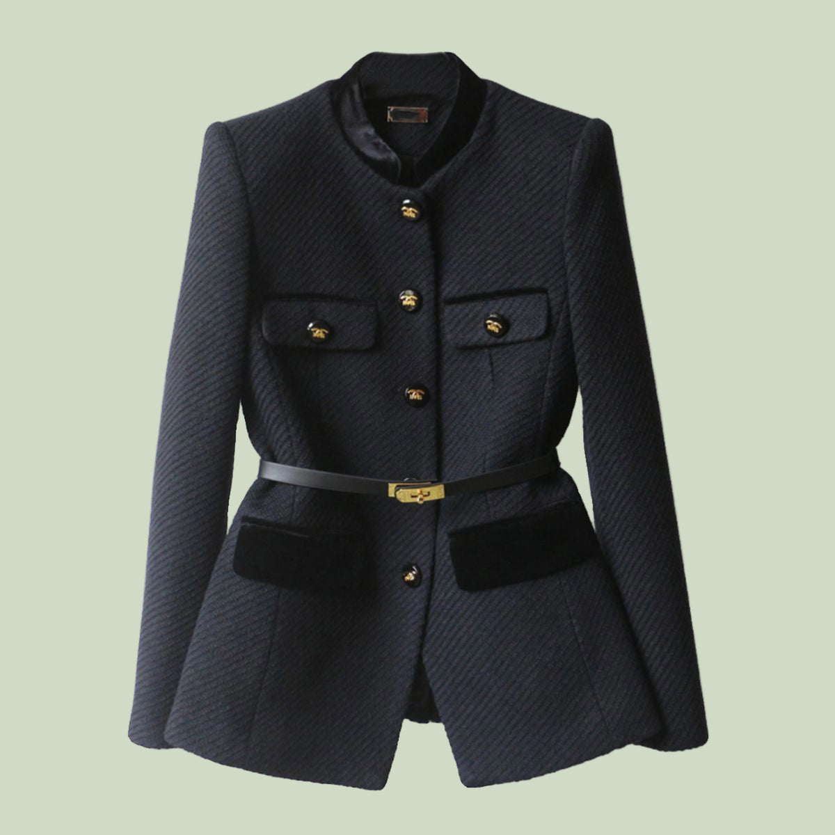 Dark blue textured blazer with gold buttons on a light green background