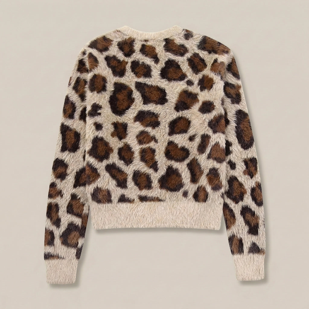 Leopard print sweater on a plain background