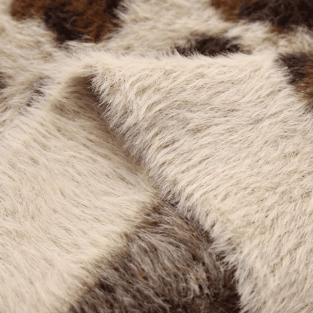 Close-up of a fur texture with brown and beige colors