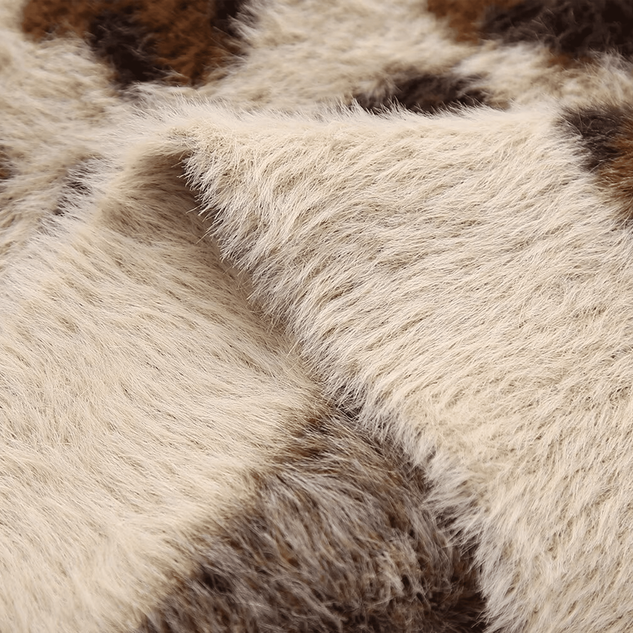 Close-up of a fur texture with brown and beige colors