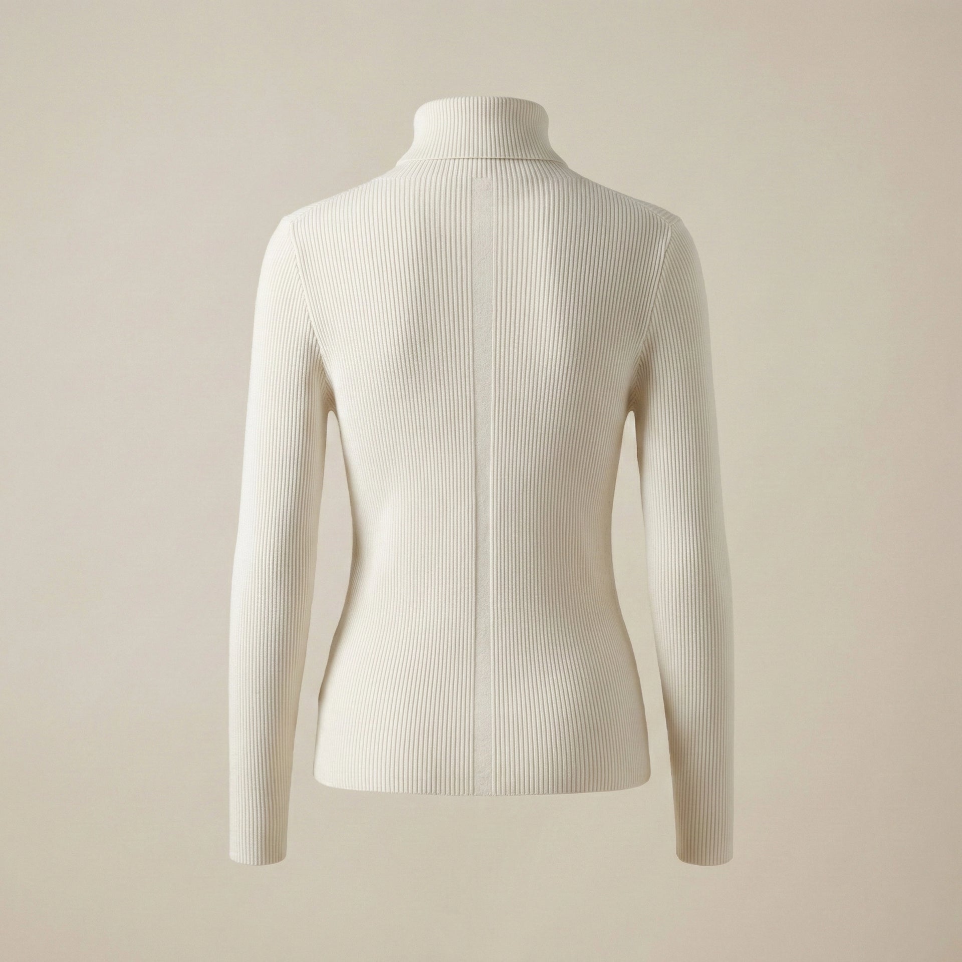 White ribbed turtleneck sweater on a beige background