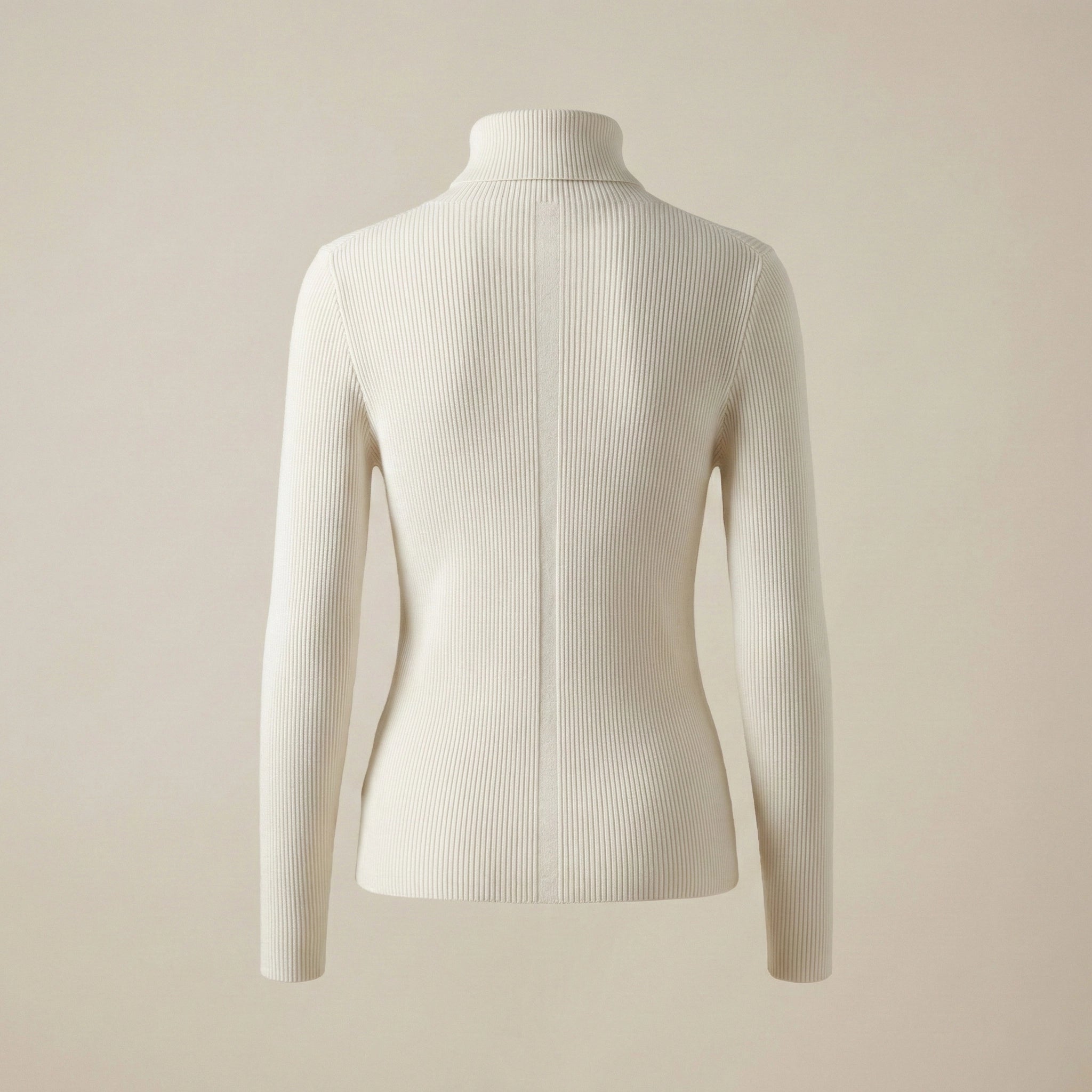 White ribbed turtleneck sweater on a beige background