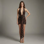 Model wearing a leopard print dress against a neutral background