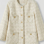 Beige textured jacket with gold buttons on a light gray background
