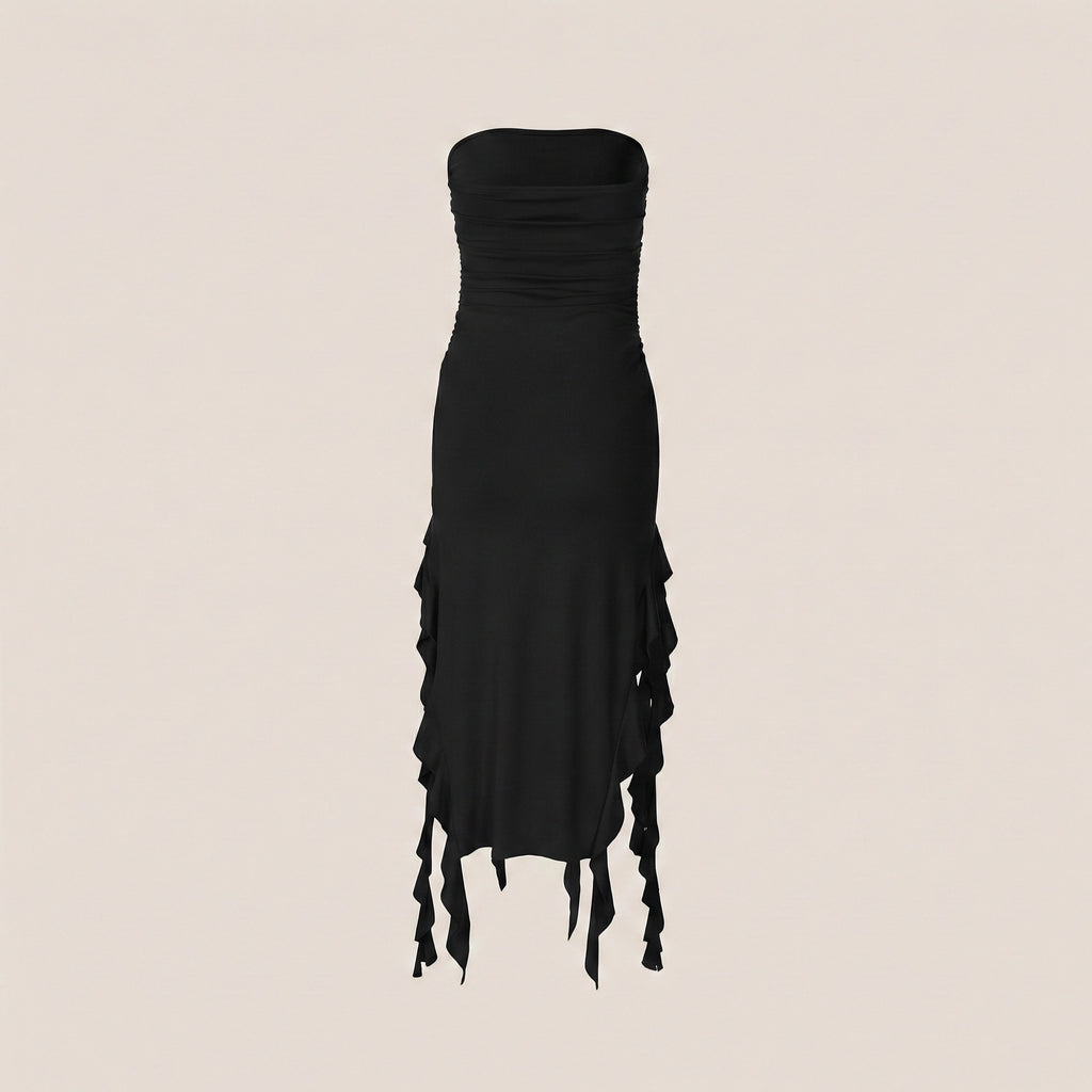 Black strapless dress with fringe details on a beige background