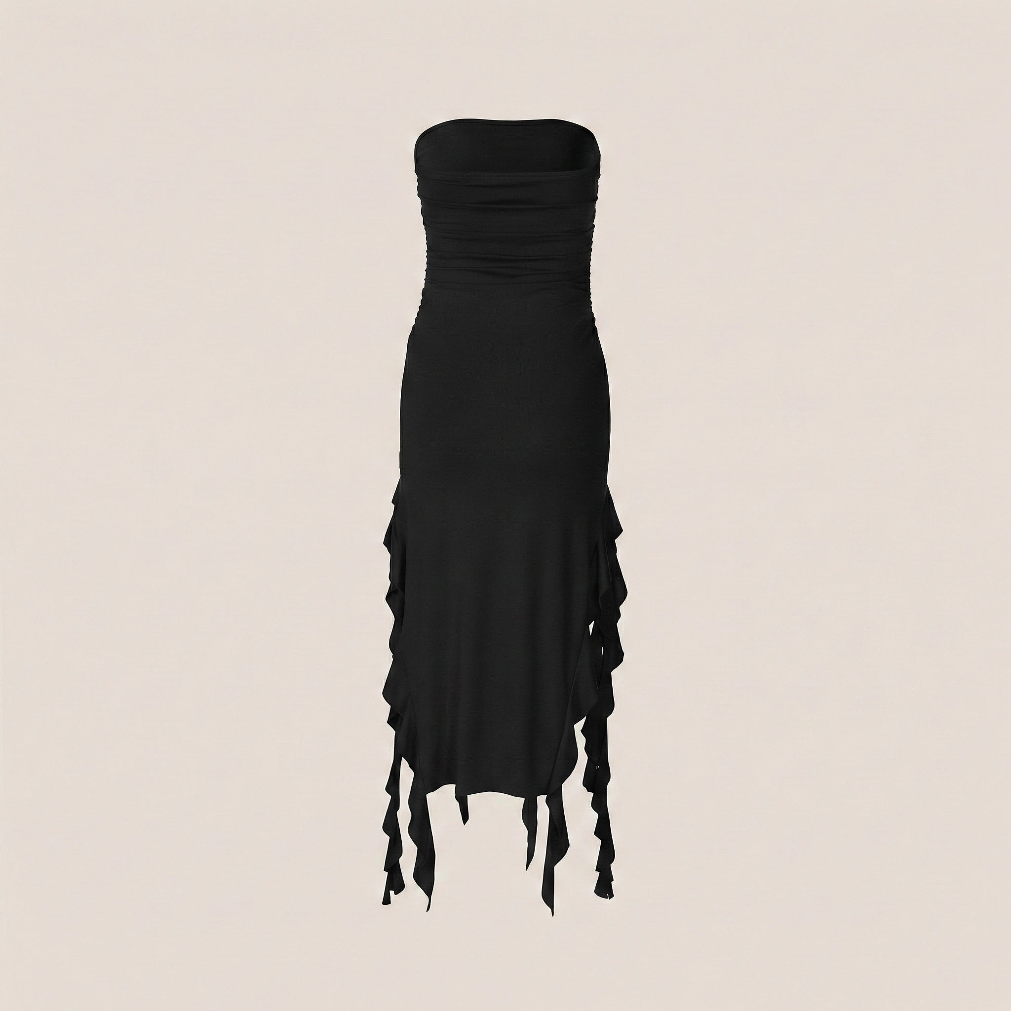 Black strapless dress with fringe details on a beige background