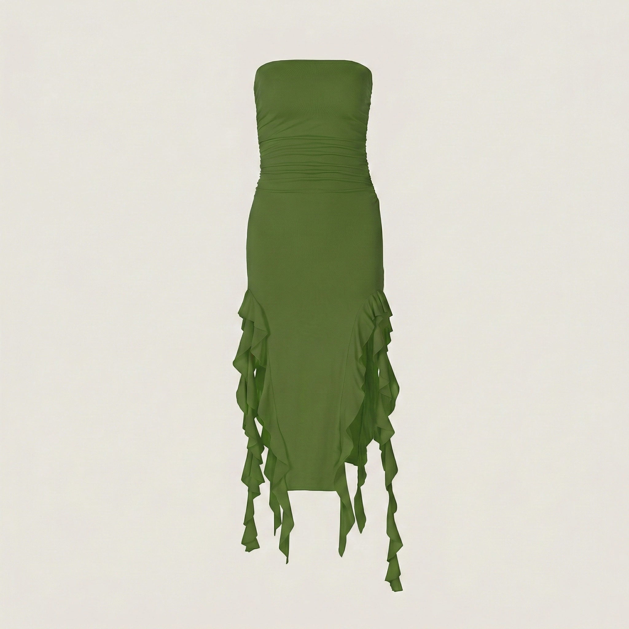 Green strapless dress with ruffled skirt on a beige background