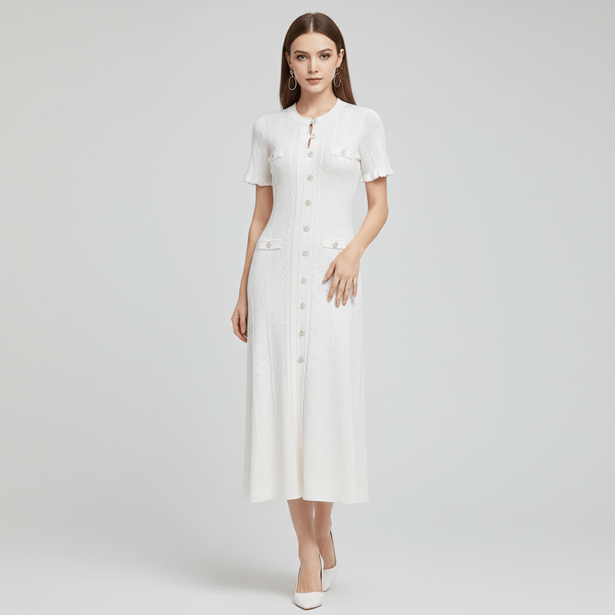 Woman wearing a white dress on a light gray background