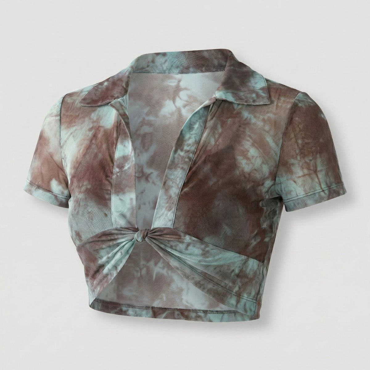 Tie-dye crop top with a knot detail on a light gray background