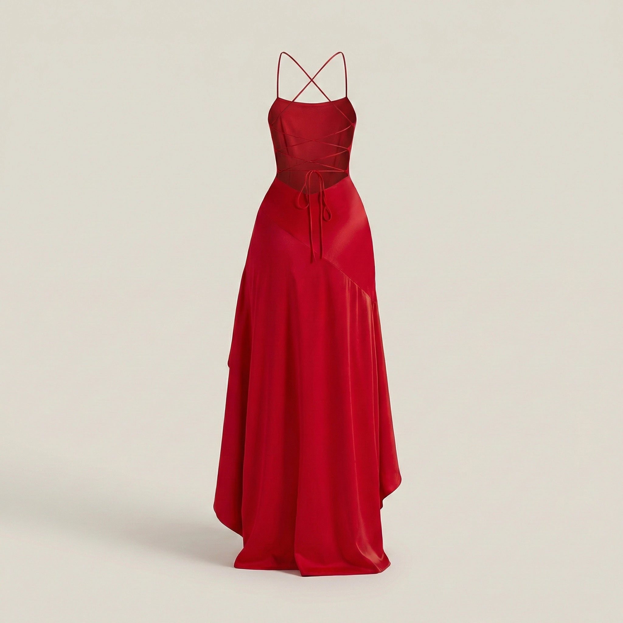 Red evening gown with thin straps on a beige background