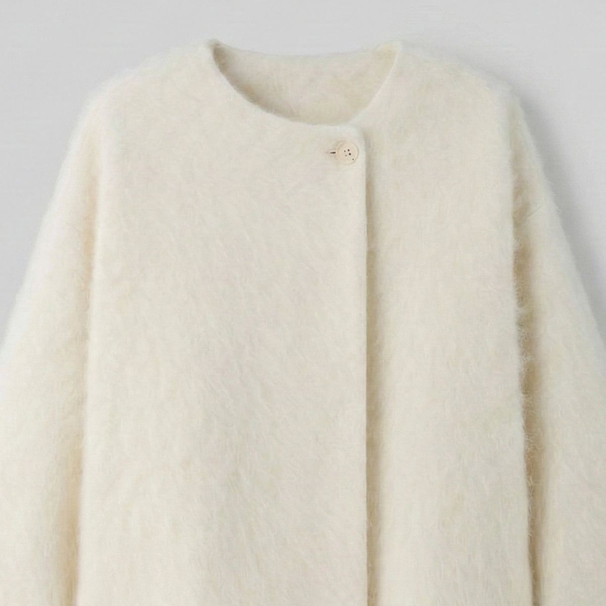 White coat on a light gray background