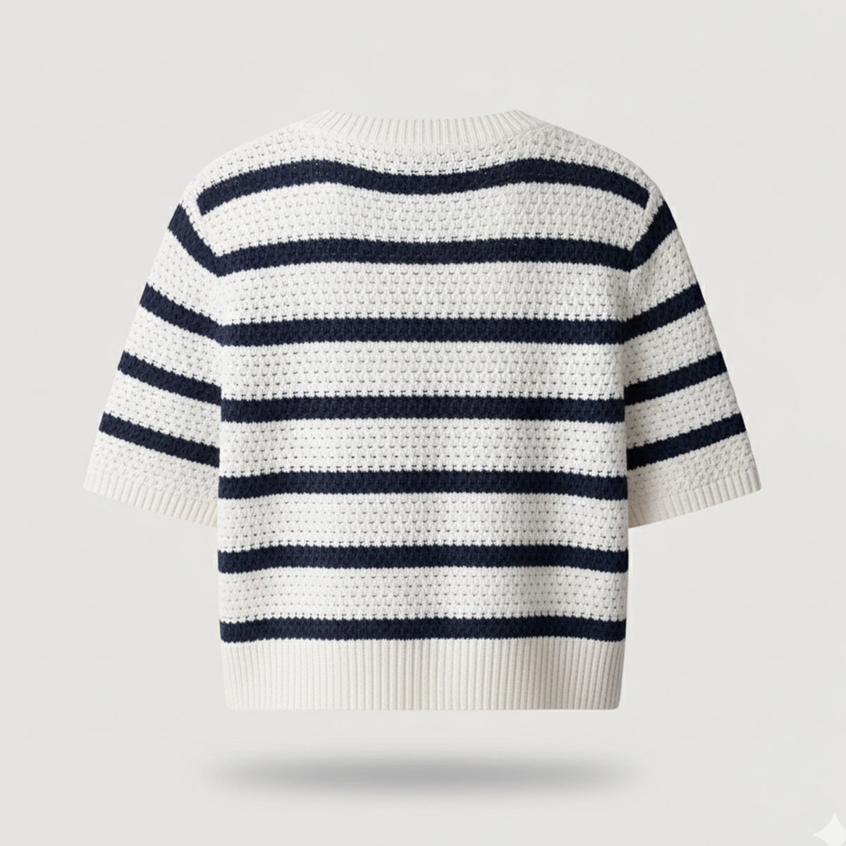 Striped sweater with navy and white colors on a light gray background
