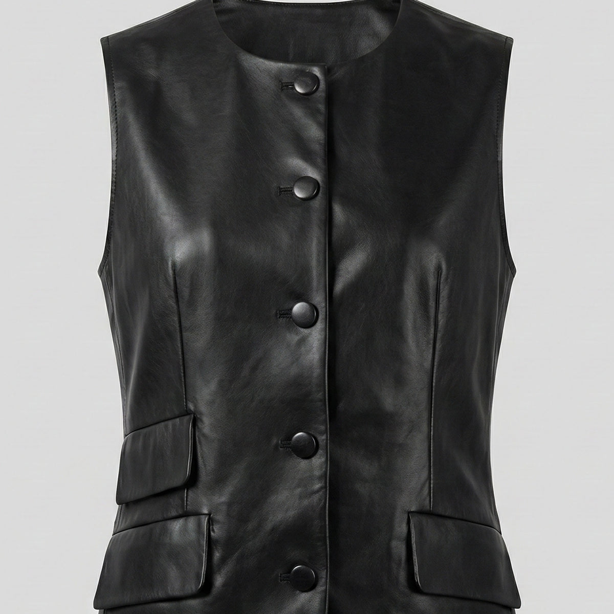 Black leather vest with button details on a light gray background