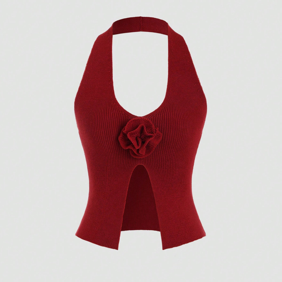 Red halter top with a floral detail on a white background
