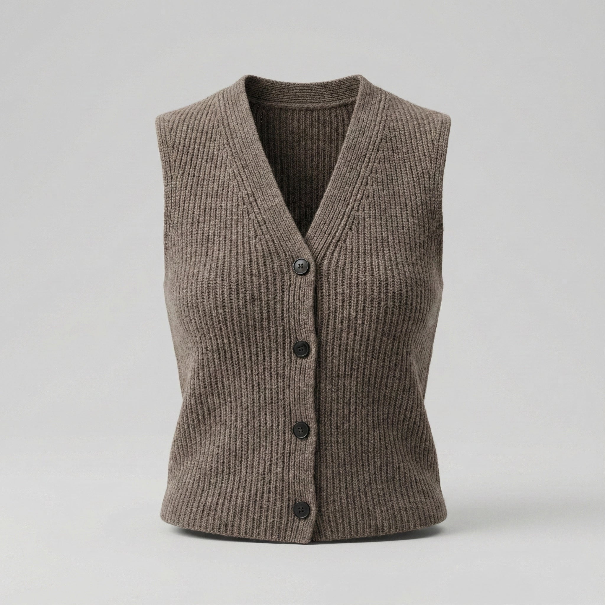 Brown knitted vest with buttons on a light gray background