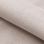 Close-up of beige fabric with a textured pattern