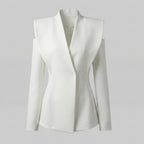 White blazer on a light gray background
