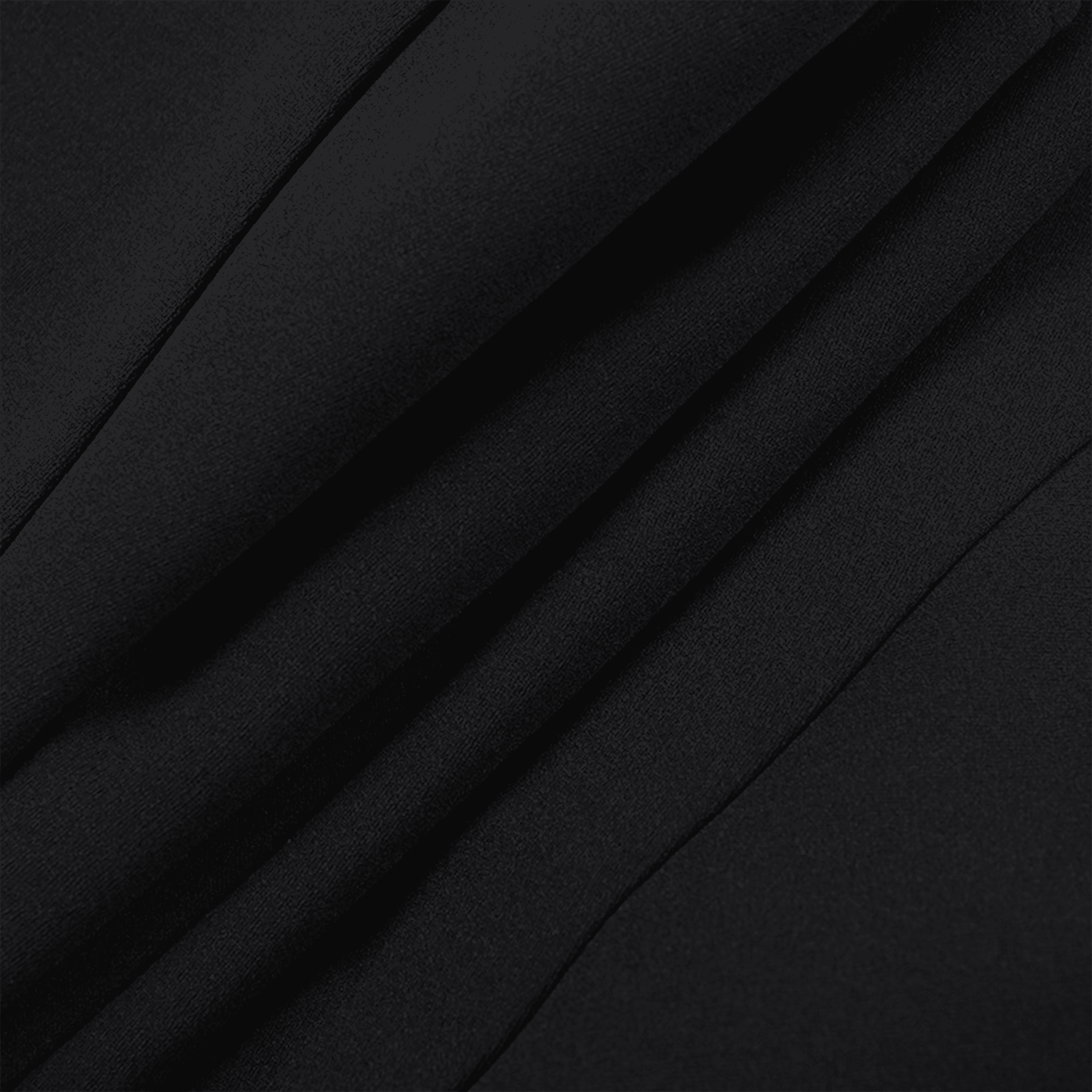Close-up of black fabric with folds
