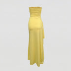 Yellow strapless dress on a light gray background