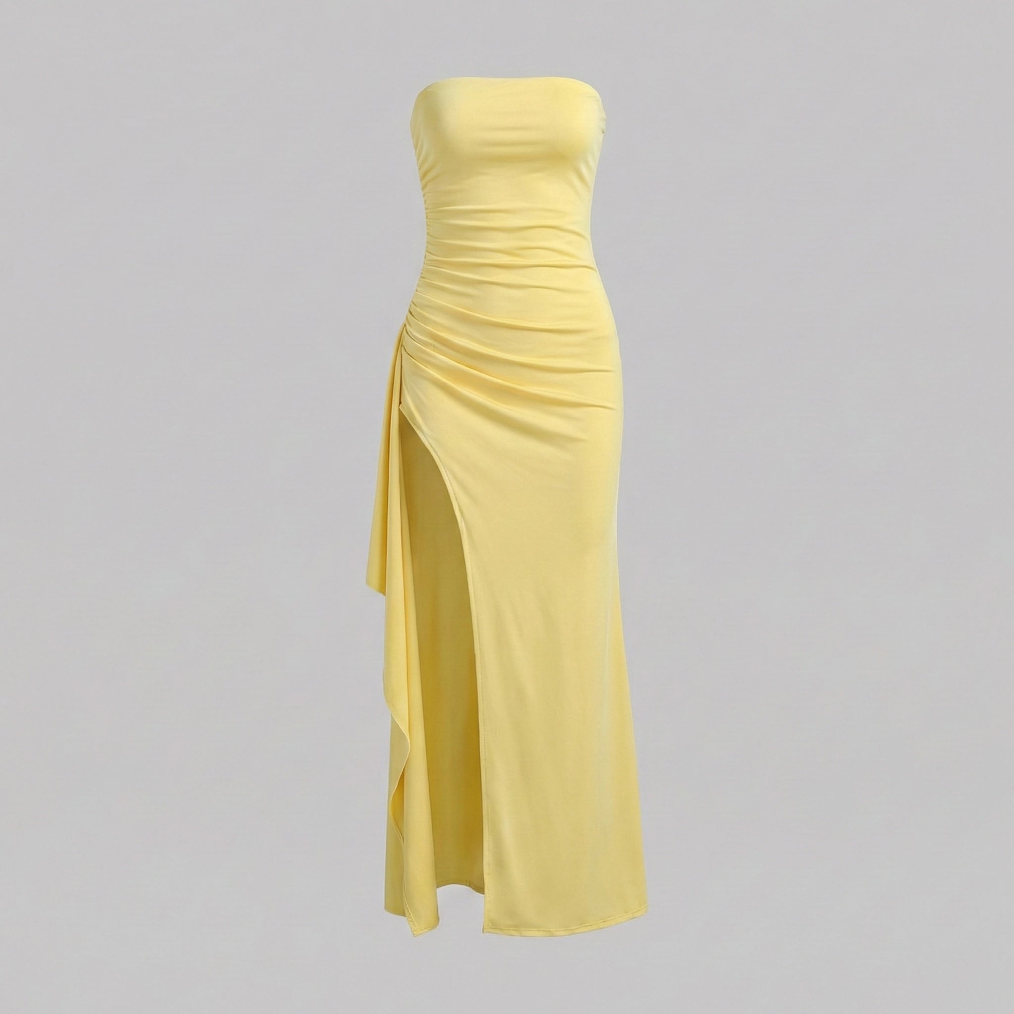 Yellow strapless gown on a gray background