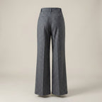 Gray pinstripe pants on a beige background