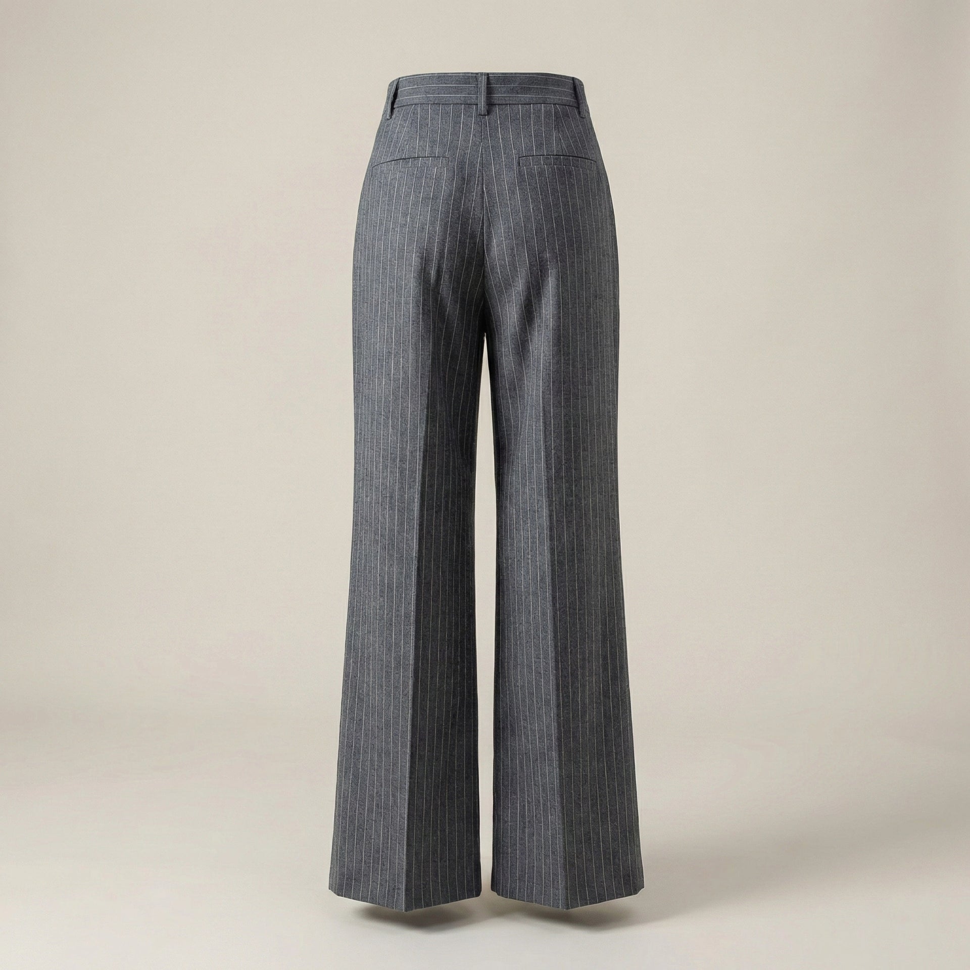 Gray pinstripe pants on a beige background