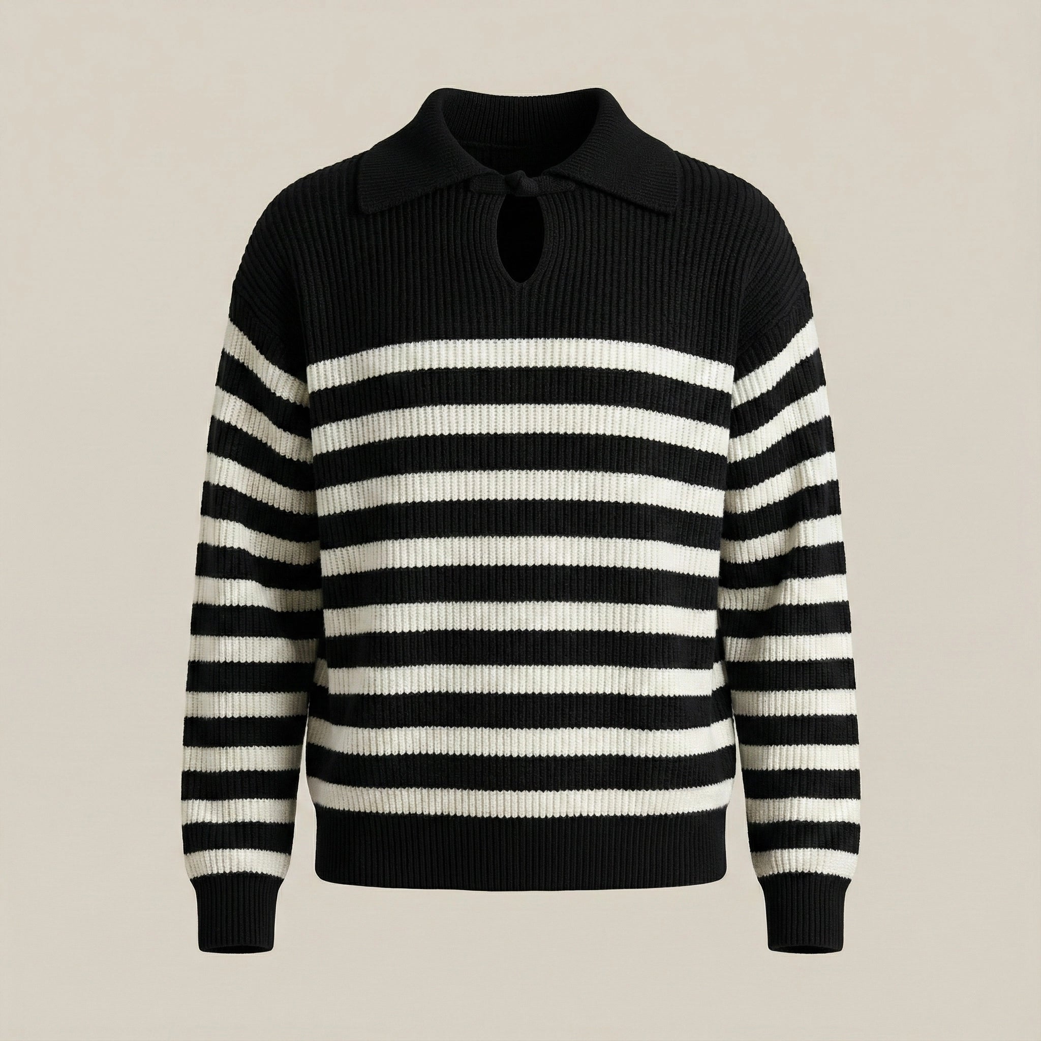 Black and white striped sweater on a beige background