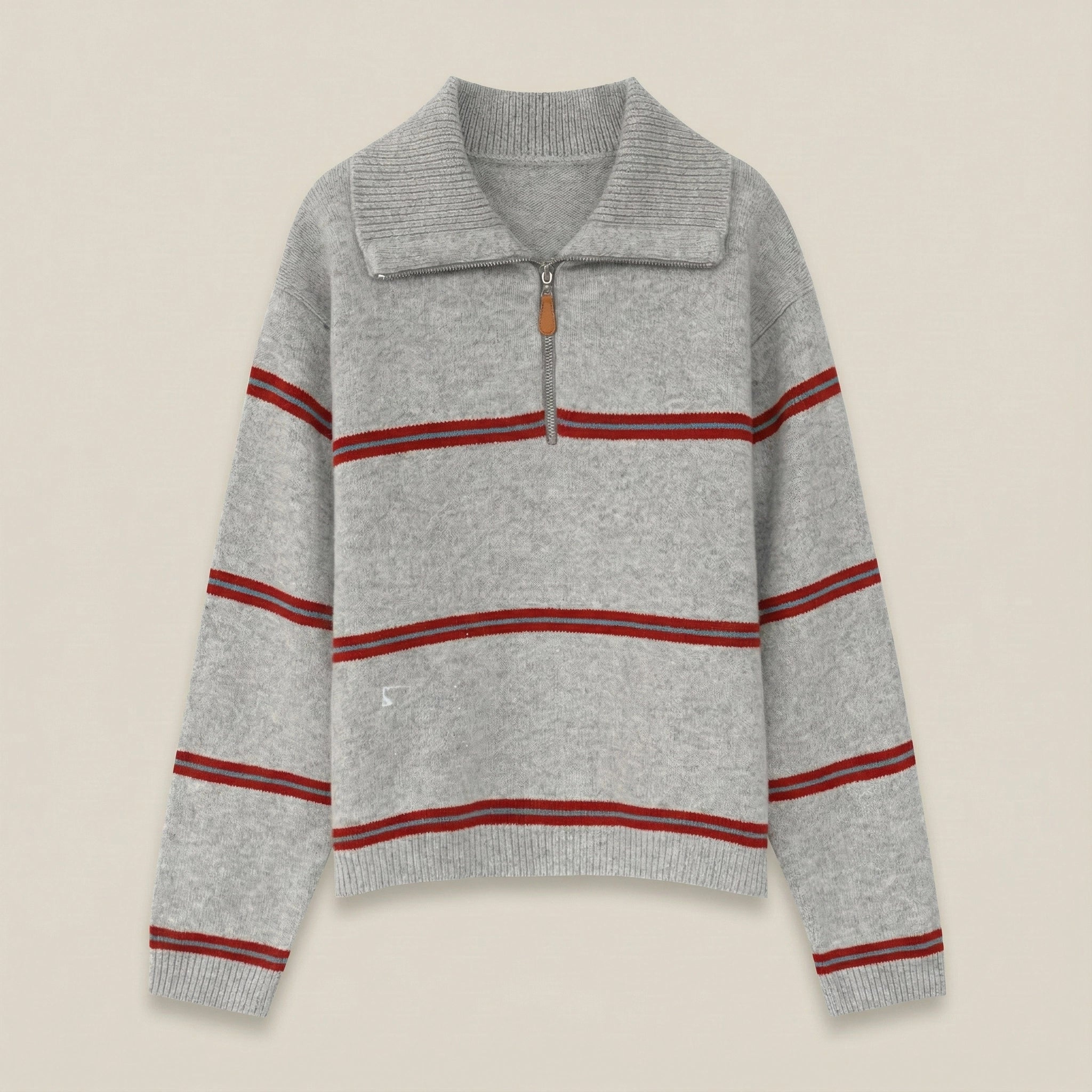 Gray sweater with red stripes on a beige background