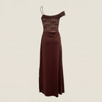 Brown evening gown with lace detailing on a beige background