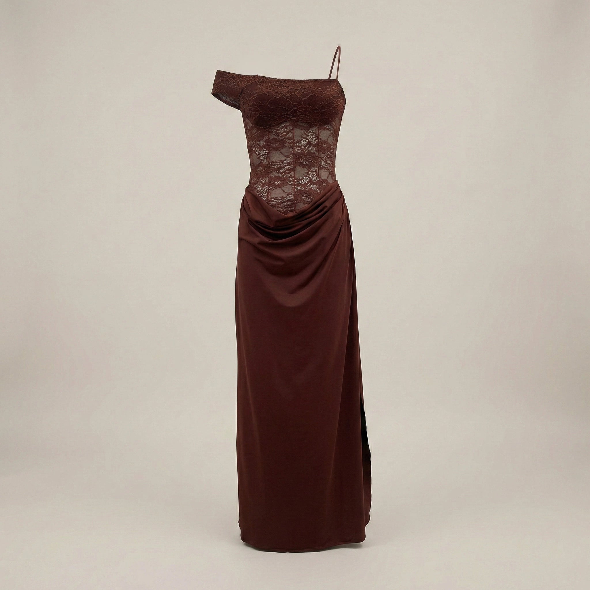 Brown evening gown with lace detailing on a beige background