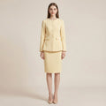 Woman wearing a light yellow suit on a beige background