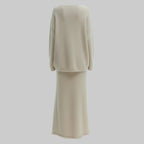 Beige two-piece outfit on a white background