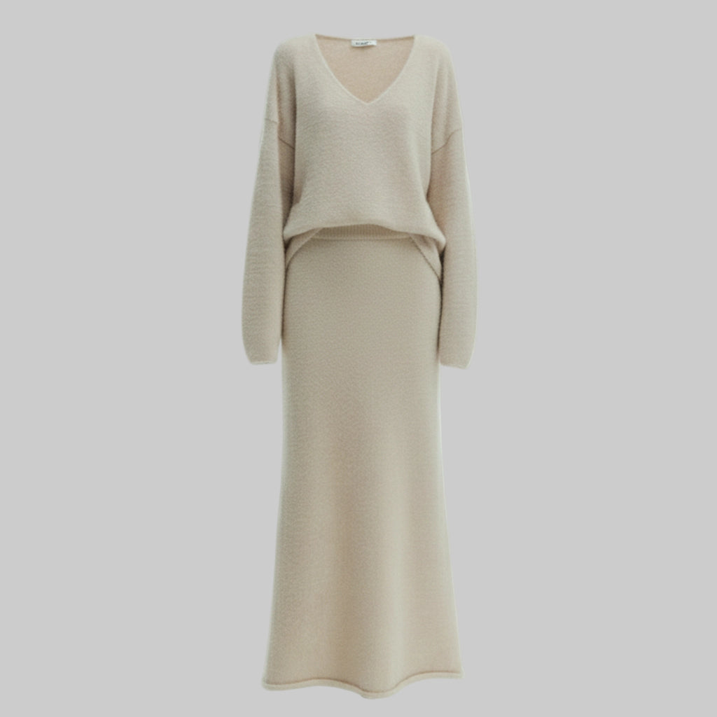 Beige long-sleeve top and skirt set on a white background