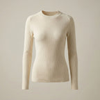 Beige ribbed long-sleeve sweater on a beige background