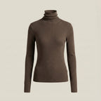 Brown turtleneck sweater on a beige background