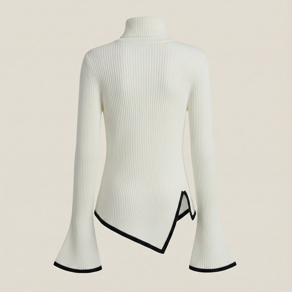 White ribbed sweater with black trim on a beige background