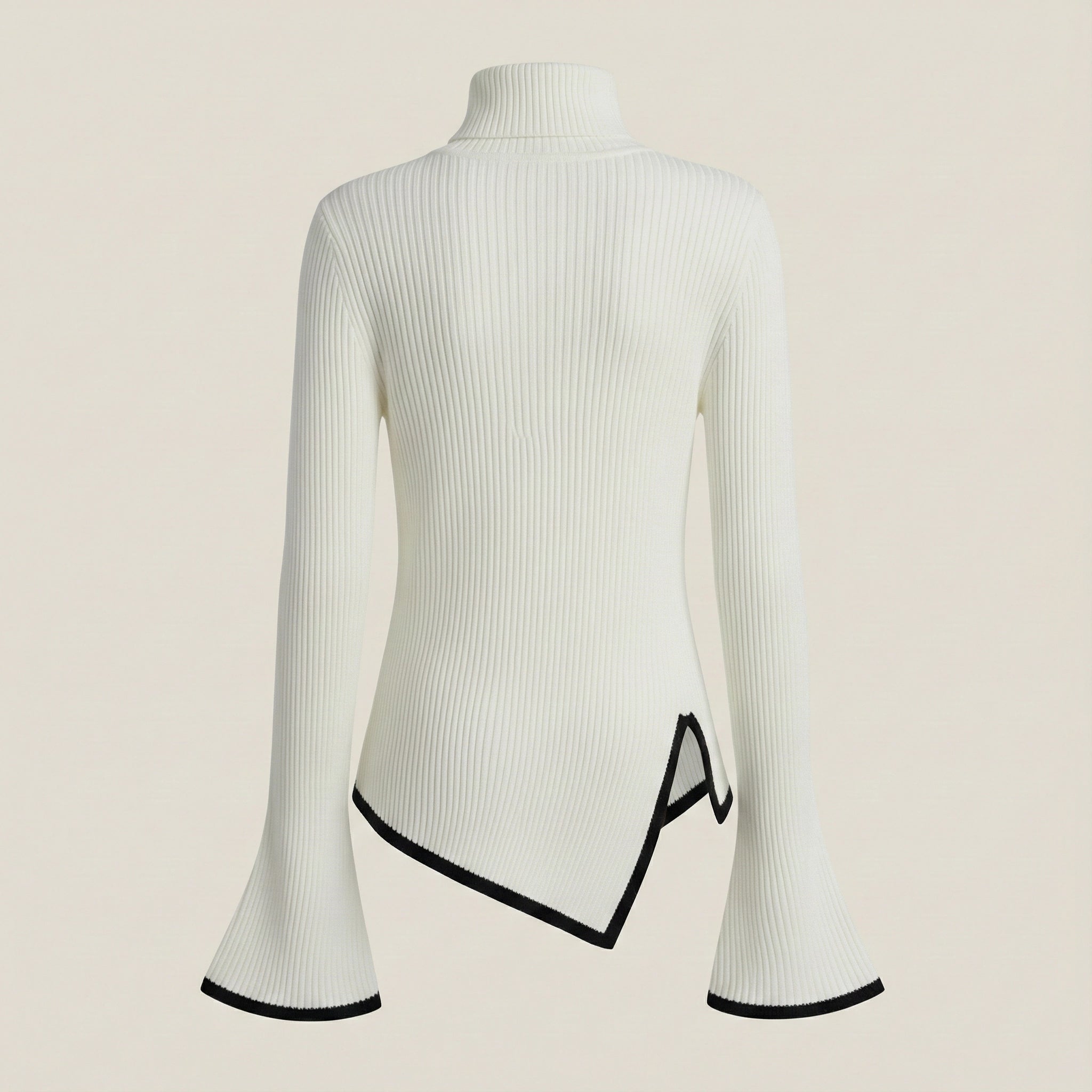 White ribbed sweater with black trim on a beige background