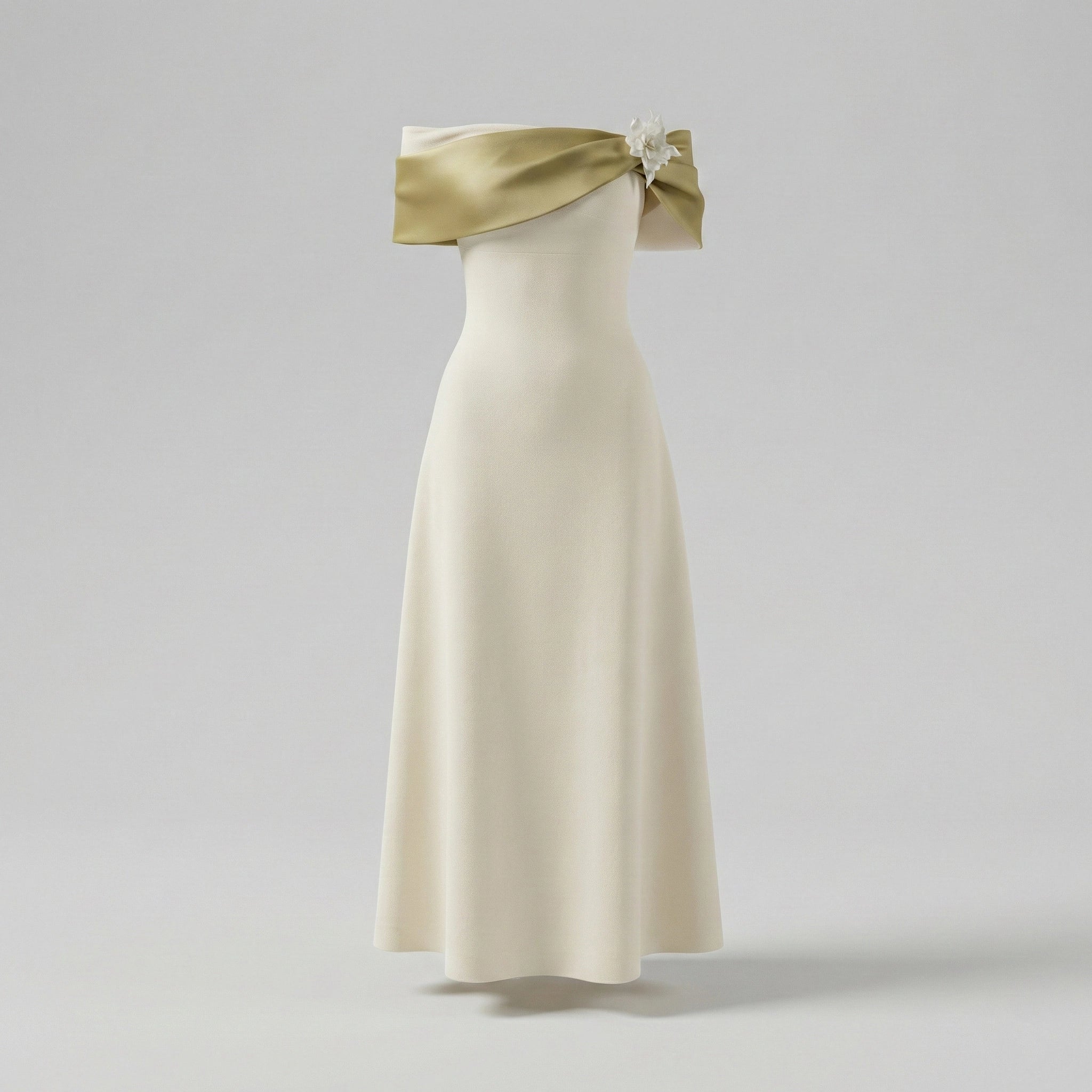 White evening gown with gold strap on a light gray background