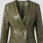 Green leather blazer on a white background