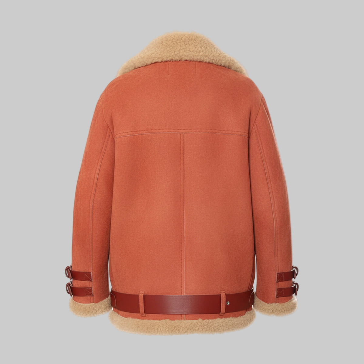 Brown leather jacket with beige fur lining on a white background