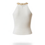 White halter top with gold embellishments on a white background