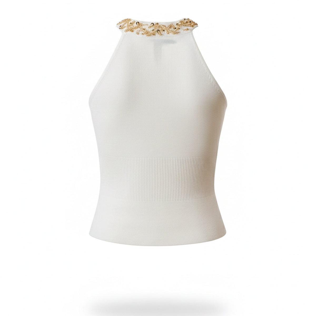 White halter top with gold embellishments on a white background