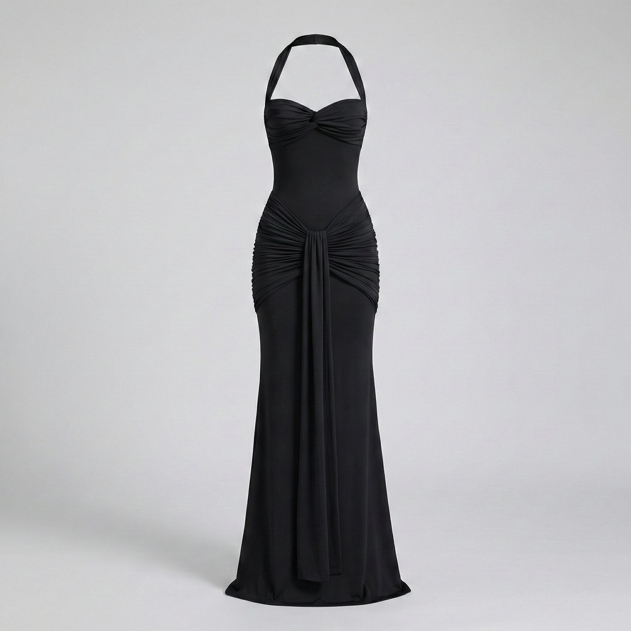 Black evening gown on a light gray background