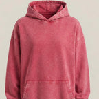 Red hoodie on a beige background