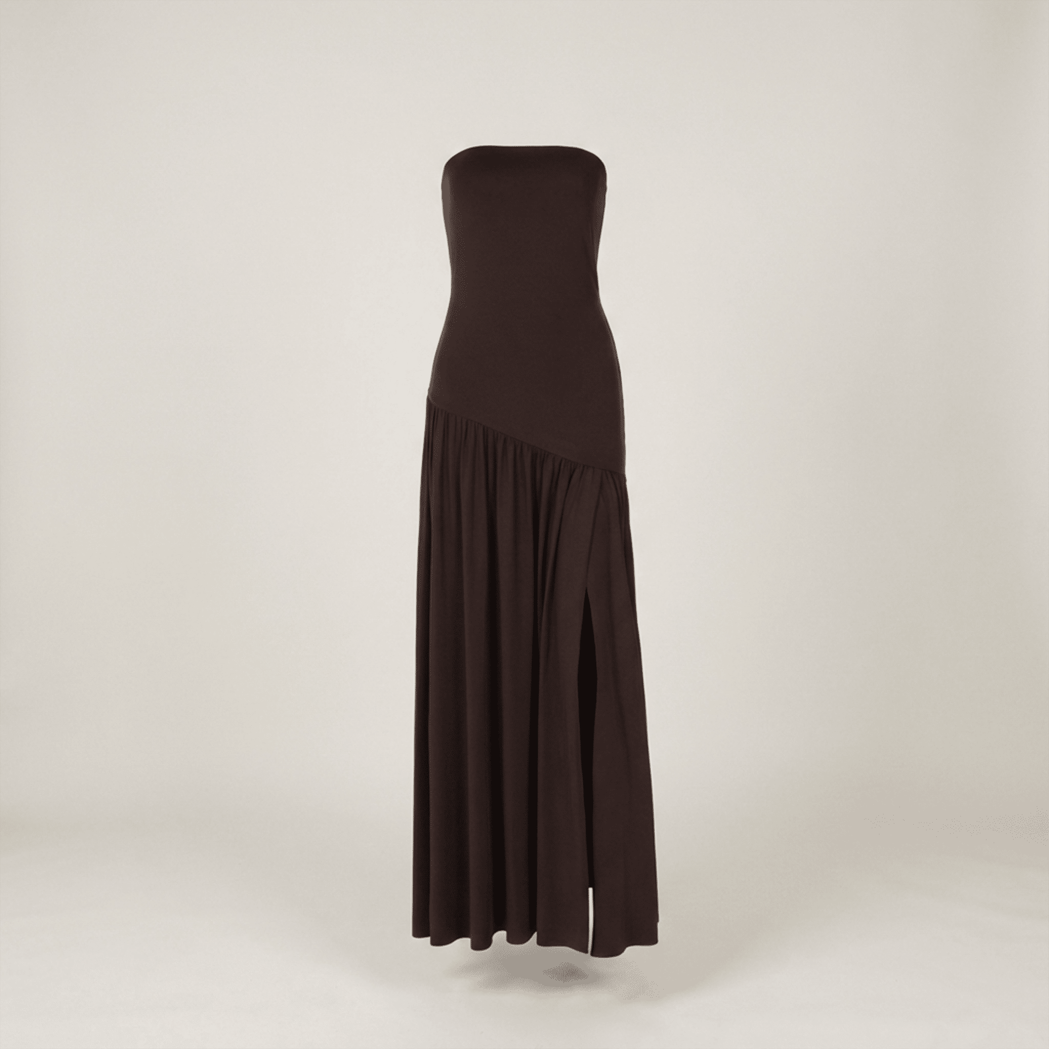 Brown strapless dress on a light beige background