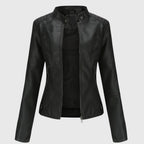 Black leather jacket on a light gray background