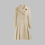 Beige coat with gold buttons on a gray background