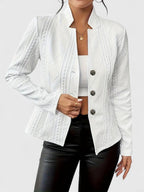 White textured jacket worn by a person on a white background